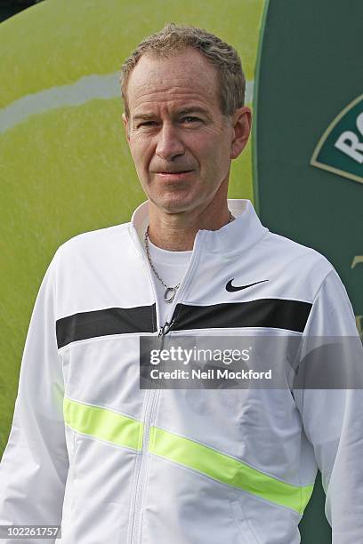 John McEnroe Tennis legend poses for photos to celebrate Robinson's 75th anniversary of their partnership with the Wimbledon Championships on June...