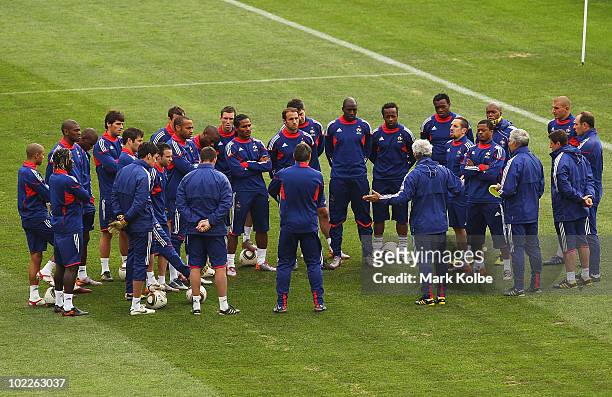French coach Raymond Domenech speaks to his team at a France training session during the FIFA 2010 World Cup at Pezula Field of Dreams on June 21,...