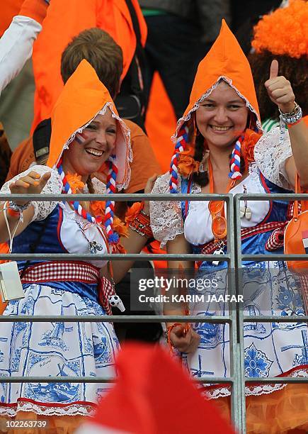 Netherlands fans celebrate after the Group E first round 2010 World Cup football match Japan versus Netherlands on June 19, 2010 at Moses Mabhida...