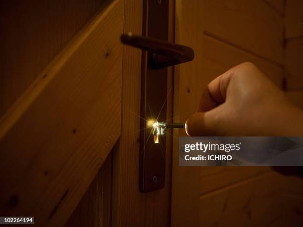 key and keyhole. - key hole stock pictures, royalty-free photos & images