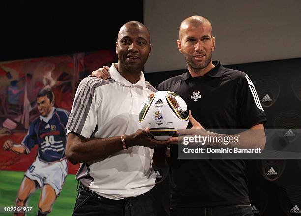 Lucas Radebe and Zinedine Zidane attend a Press Conference on the eve of the France vs South Africa Group A match, on June 21, 2010 in Sandton, South...