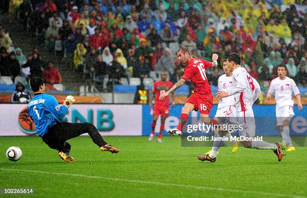 Raul Meireles of Portugal scores the opening goal during the 2010 FIFA World Cup South Africa Group G match between Portugal and North Korea at the...