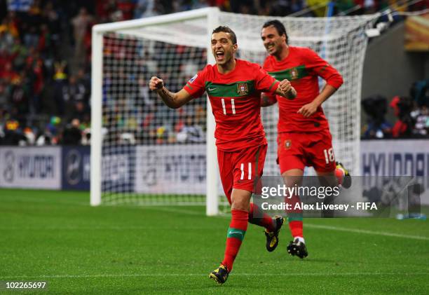 Simao of Portugal celebrates with Hugo Almeida after scoring the second goal during the 2010 FIFA World Cup South Africa Group G match between...