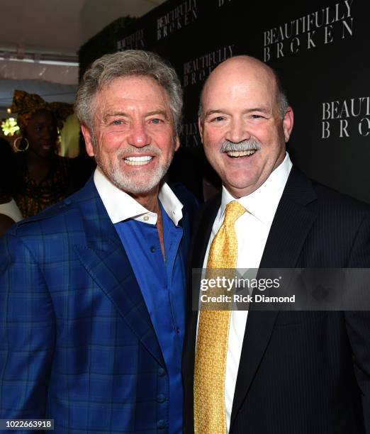 Country singer Larry Gatlin and Executive Producer Randy Hartley attend "Beautifully Broken" World Premiere at The Factory at Franklin on August 20,...