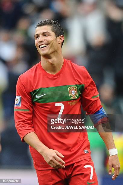 Portugal's striker Cristiano Ronaldo celebrates after scoring the sixth goal during the Group G first round 2010 World Cup football match North Korea...
