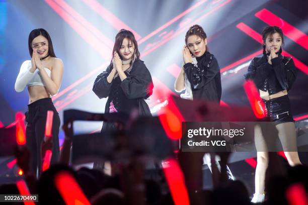 Contestants Ju Lin, Wu Xuanyi, Jiang Jing'er and Zhang Chuhan perform 'Promise' onstage on May 14, 2018 in Hangzhou, Zhejiang Province of China....