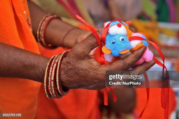 An Indian women choose 'Rakhi' for their brothers ahead the Hindu festival 'Raksha Bandhan' , in Jaipur, Rajasthan , India, August 24,2018. Raksha...