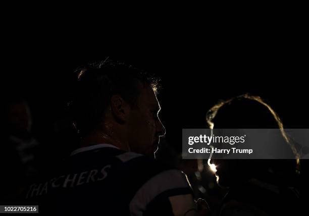 Will Chudley and Max Clark of Bath Rugby make their way off the pitch after the match during the Pre Season Friendly match between Bath and Scarlets...