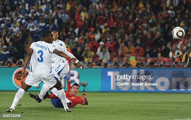 David Villa of Spain scores the opening goal during the 2010 FIFA World Cup South Africa Group H match between Spain and Honduras at Ellis Park...