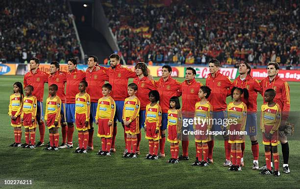 The Spain team line up for the national anthems during the 2010 FIFA World Cup South Africa Group H match between Spain and Honduras at Ellis Park...