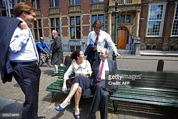 Dutch politicians Alexander Pechtold , Femke Halsema , Mark Rutte and Job Cohen discuss in The Hague on June 21 during their coalition talks. AFP...