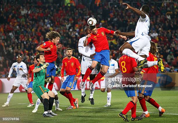 David Villa of Spain fires a header at goal during the 2010 FIFA World Cup South Africa Group H match between Spain and Honduras at Ellis Park...