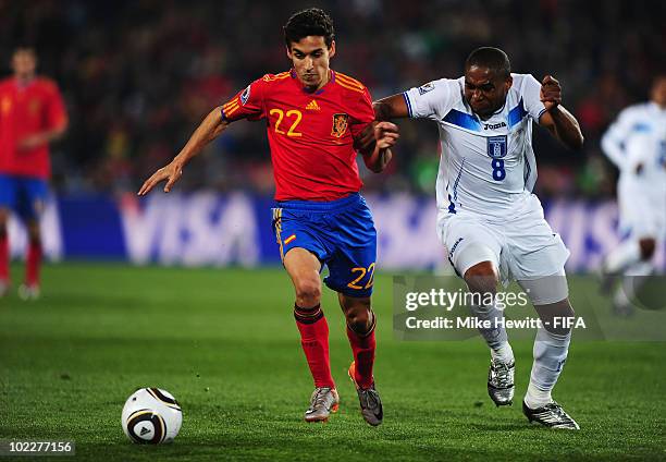 Jesus Navas of Spain is challenged by Wilson Palacios of Honduras during the 2010 FIFA World Cup South Africa Group H match between Spain and...