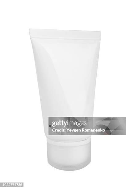 white cosmetic bottle, isolated on white background - creme tube imagens e fotografias de stock