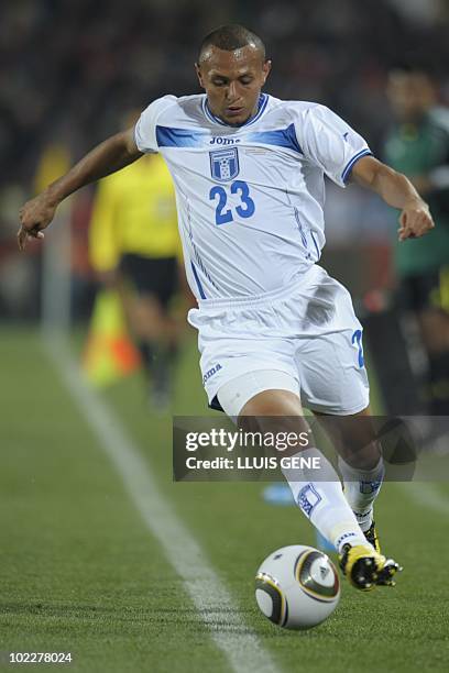 Honduras' defender Sergio Mendoza runs with the ball during the Group H first round 2010 World Cup football match Spain vs. Honduras on June 21, 2010...