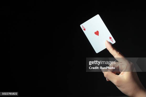 hand holding ace card - id cards bildbanksfoton och bilder