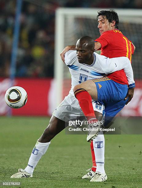 David Suazo of Honduras under pressure from Joan Capdevila of Spain during the 2010 FIFA World Cup South Africa Group H match between Spain and...