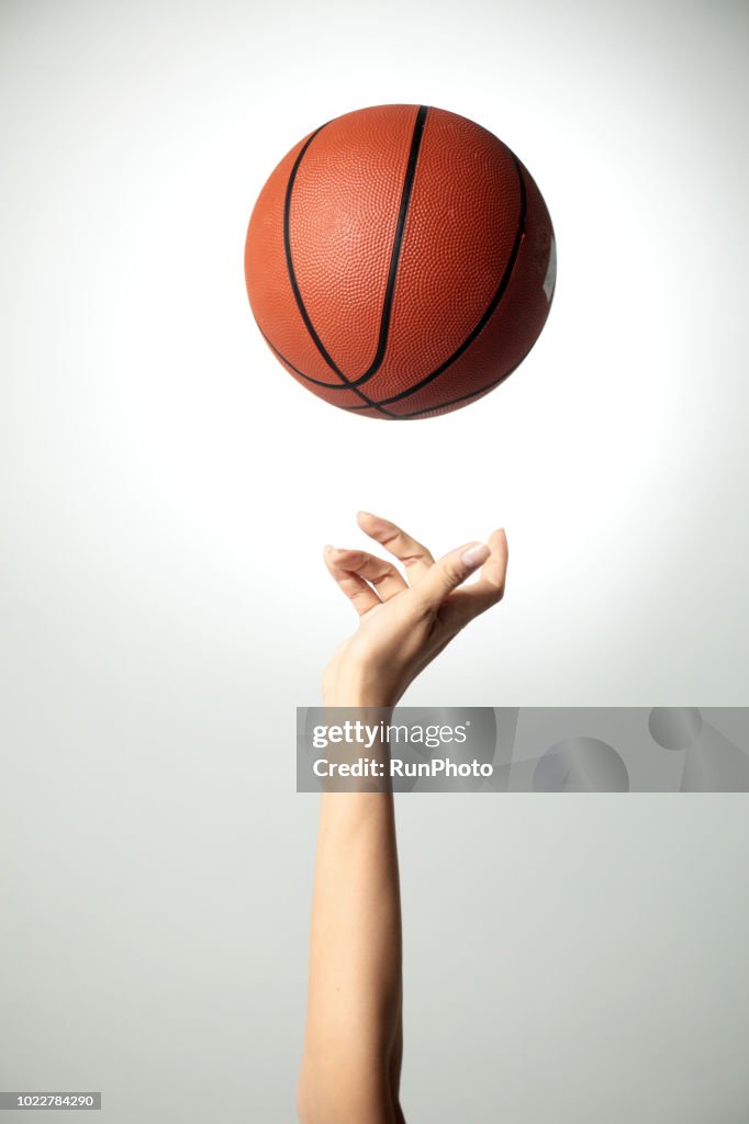 Hand with basketball