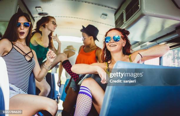 grupp tonåringar firar på bussen - party bus bildbanksfoton och bilder