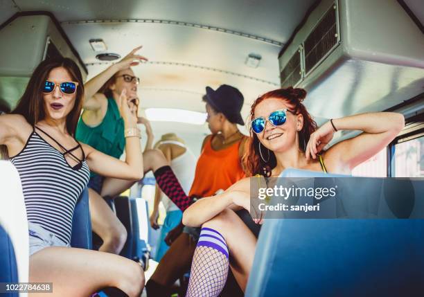 group of teenagers celebrating on the bus - party bus stock pictures, royalty-free photos & images