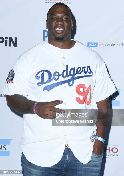 Donovan Carter arrives at the 6th Annual PingPong4Purpose at Dodger Stadium on August 23, 2018 in Los Angeles, California.