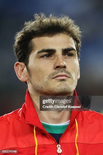 Iker Casillas of Spain lines up for the national anthems prior to the 2010 FIFA World Cup South Africa Group H match between Spain and Honduras at...