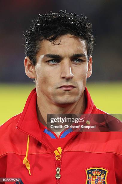 Jesus Navas of Spain lines up for the national anthems prior to the 2010 FIFA World Cup South Africa Group H match between Spain and Honduras at...