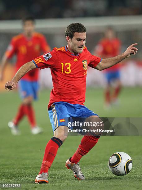 Juan Manuel Mata of Spain runs with the ball during the 2010 FIFA World Cup South Africa Group H match between Spain and Honduras at Ellis Park...