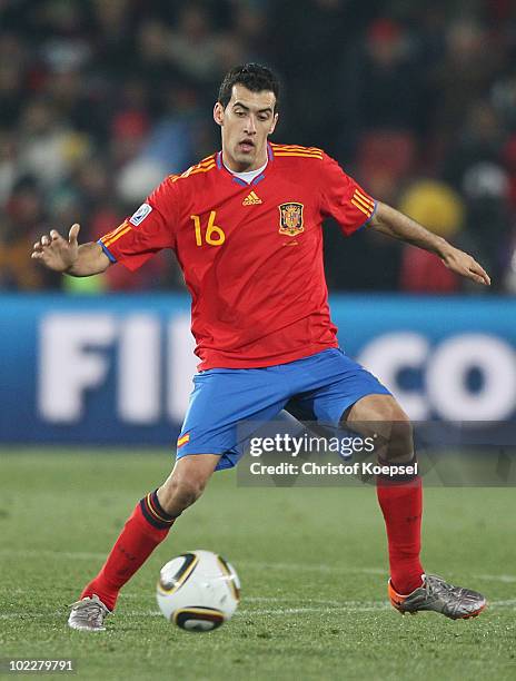 Sergio Busquets of Spain runs with the ball during the 2010 FIFA World Cup South Africa Group H match between Spain and Honduras at Ellis Park...