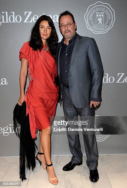 Zofia Borucka and Jean Reno attend the "Cento Anni Di Eccellenza" Exhibition Launch party during Milan Fashion Week Menswear Spring/Summer 2011 on...