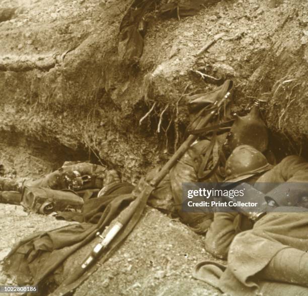 Siesta, Verdun, northern France, 1916. Three French soldiers find shelter for some sleep. Two of the soldiers, or 'Poilus', as the bulk of the French...