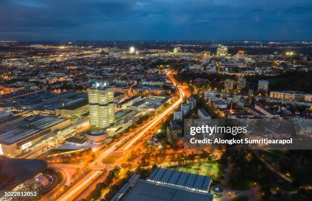 night aerial view of munich from olympiaturm (olympic tower). munich, bavaria, germany - munich germany urban skyline stock pictures, royalty-free photos & images