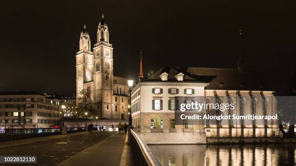 the grossmunster (great minster) is one of the three major churches in zurich, switzerland. - grossmunster cathedral stock pictures, royalty-free photos & images