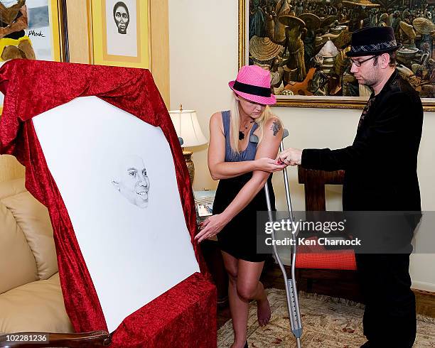 Artist, David Ilan , unveils the portrait at the Special Recognition Event in support of The Michael Jackson Tribute Portrait at the home of Dr. Maya...