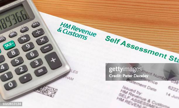 self assessment tax form - paid englischer begriff stock-fotos und bilder