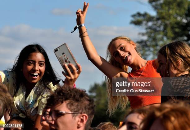 Fans watch Circa Waves on the main stage at RiZE Festival on August 17, 2018 in Chelmsford, United Kingdom.