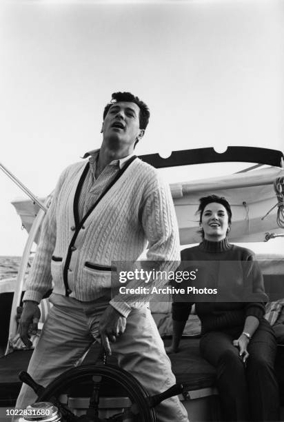 Actors Rock Hudson and Linda Cristal on board a yacht, 18th February 1960.