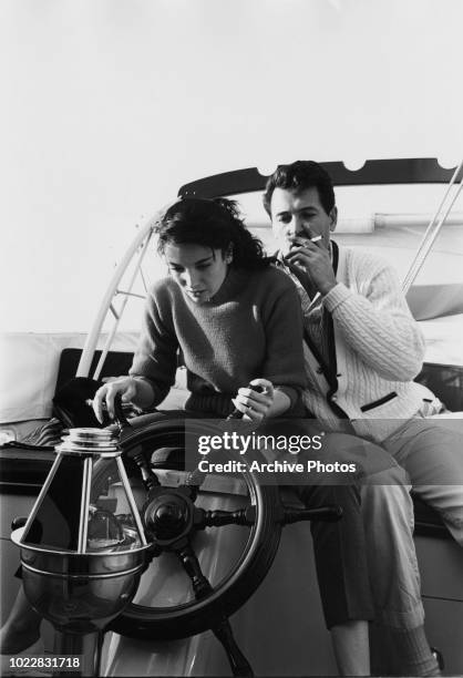 Actors Rock Hudson and Linda Cristal on board a yacht, 18th February 1960.