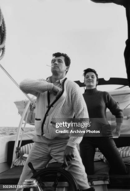 Actors Rock Hudson and Linda Cristal on board a yacht, 18th February 1960.