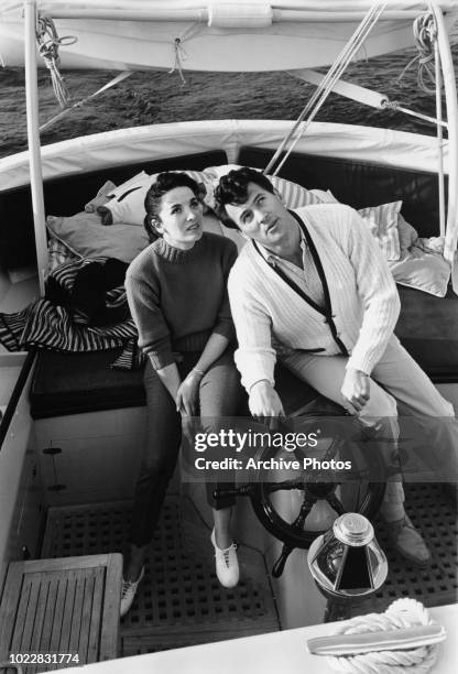 Actors Rock Hudson and Linda Cristal on board a yacht, 18th February 1960.