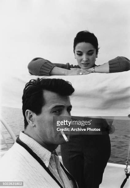 Actors Rock Hudson and Linda Cristal on board a yacht, 18th February 1960.