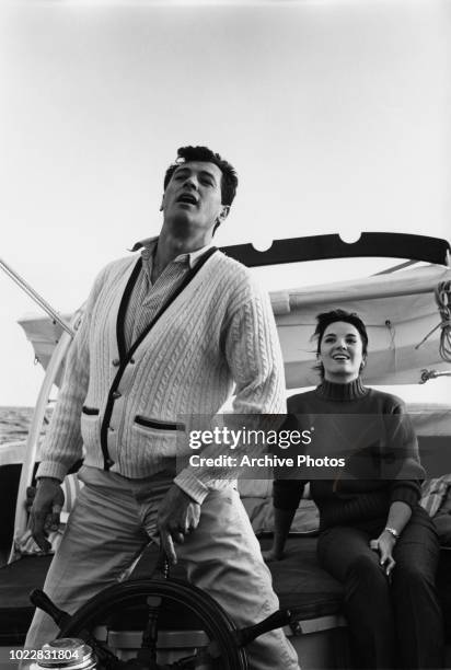 Actors Rock Hudson and Linda Cristal on board a yacht, 18th February 1960.