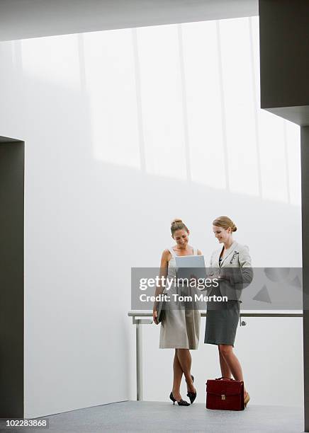 businesswomen talking outdoors - business meeting copy space stock pictures, royalty-free photos & images