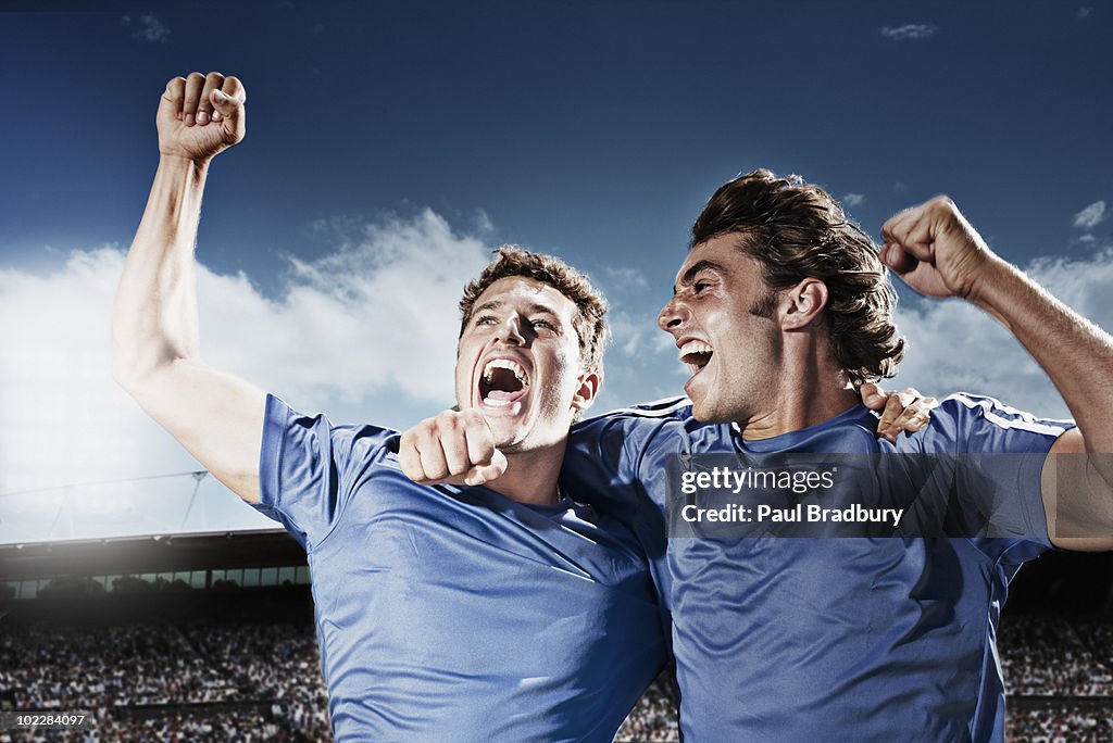 Soccer players cheering