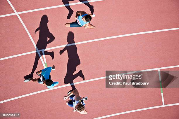 runners competing on track - sydney racing stock pictures, royalty-free photos & images