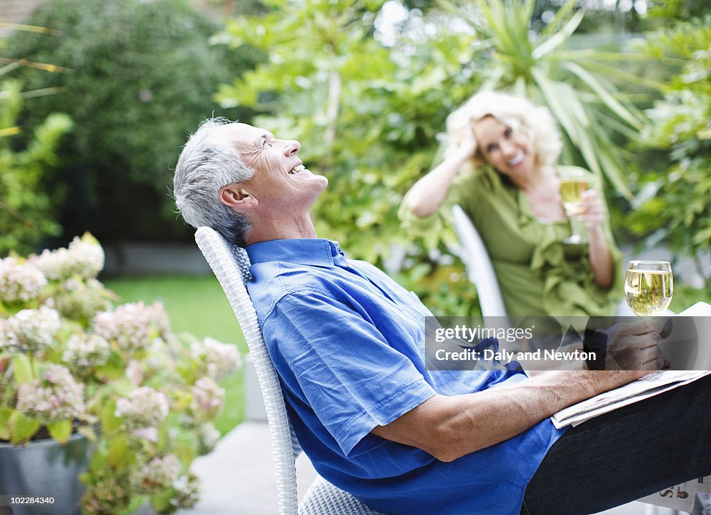 Couple drinking wine on patio