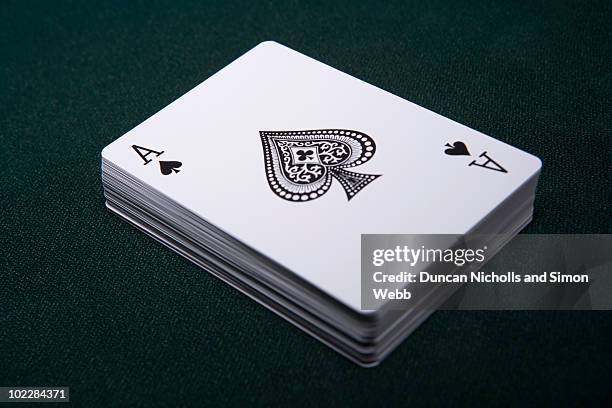 deck of playing cards with ace on top - ace of spades stock pictures, royalty-free photos & images