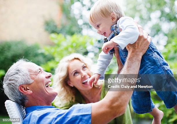 grandparents enjoying grandson - baby grandpa imagens e fotografias de stock