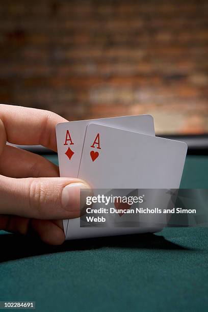 close up of pair of aces in casino - paio foto e immagini stock