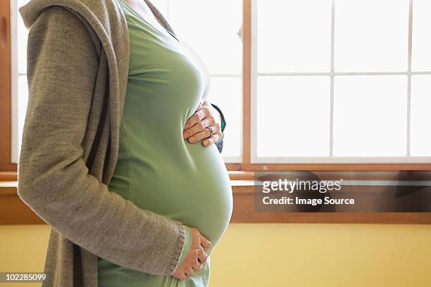 pregnant woman - bumpy stockfoto's en -beelden